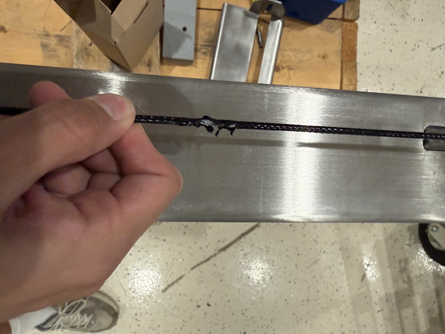 Damaged cable showing abrasion